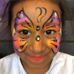 girl with butterfly face paint