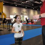 magic martin wowing a child at trade show in london