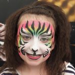 girl with tiger face paint