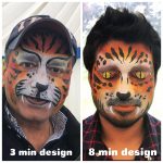 men with tiger face paint